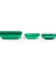 Matched trio set of baguette-cut natural loose Colombian emeralds in deep bluish-green.