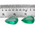 Matched pair set loose emeralds pear cut 3.62 ct. front side table-crown view with ruler sizer
