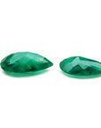 Matched pair of 3.62 carat pear-cut bluish-green Colombian emeralds.