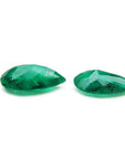 Matched pair of 3.62 carat pear-cut bluish-green Colombian emeralds.