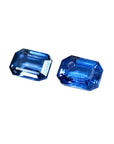 Natural blue sapphires matching pair emerald-cut for earrings, left position, displaying tables and crowns