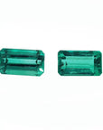Matching pair of emerald-cut 3.38 ct. loose emeralds, vibrant bluish medium deep green.