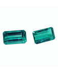Emerald-cut 3.38 ct. matching pair of loose, vibrant bluish-green Colombian emeralds.