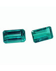 Emerald-cut 3.38 ct. matching pair of loose, vibrant bluish-green Colombian emeralds.