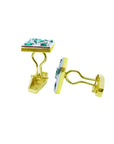 14K yellow gold May birthstone cufflinks with multiple round emeralds.