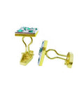 14K yellow gold May birthstone cufflinks with multiple round emeralds.