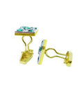 14K yellow gold May birthstone cufflinks with multiple round emeralds.