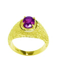 Men's 18K yellow gold ring with a solitaire oval pinkish-red Burma ruby, prong-set.