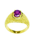 Men's 18K yellow gold ring with a solitaire oval pinkish-red Burma ruby, prong-set.
