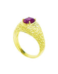 Men's 18K yellow gold ring with a solitaire oval pinkish-red Burma ruby, prong-set.