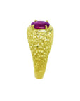 Men's 18K yellow gold ring with a solitaire oval-cut pinkish-red Burma ruby.