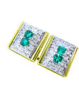 Two yellow and white gold cufflinks with emeralds and diamonds on a white background.