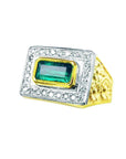 Men's 14K yellow gold ring with a rectangular bezel-set emerald surrounded by prong-set diamonds.
