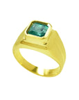 Men's 18K yellow gold pinky ring with a square, bezel-set Colombian emerald.