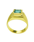 Men's 18K yellow gold pinky ring with a bezel-set, square-cut Colombian emerald.