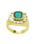 Men's 14K yellow gold ring with a cushion-cut emerald and diamond-studded horseshoe design.