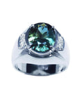 Men's 14K white gold ring with a large oval greenish-blue sapphire and diamond accents.