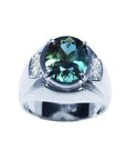 Men's 14K white gold ring with a large oval greenish-blue sapphire and diamond accents.