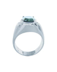 Men's 14K white gold ring with a deep greenish-blue oval sapphire and diamond accents.