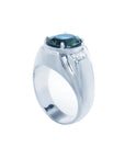 Men's 14K white gold ring with a deep greenish-blue oval cut Australian sapphire and diamond accents.