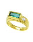 Men's 14K yellow gold ring with a deep green emerald cut Colombian emerald and a side diamond.