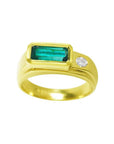 Men's 14K yellow gold ring with a deep green rectangular emerald and a round side diamond.