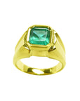A solitaire mens emerald ring displaying the top and both sides design perspective.