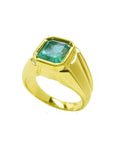Men's 14K yellow gold solitaire ring with a square emerald-cut medium green emerald, bezel set.