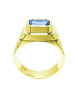 Men's 18k yellow gold ring with a bezel-set, octagonal blue sapphire.