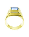 Men's 18k yellow gold ring with a bezel-set, octagonal blue sapphire.