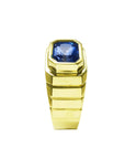 Men's natural sapphire solitaire ring bezel set crafted in 18k yellow gold, top perspective side view