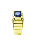 Men's 18k yellow gold ring with a bezel-set, octagonal blue sapphire.