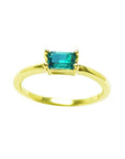 This minimalist solitaire natural colombian emerald ring prong set is made of 14k yellow gold.