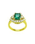 1.43 ct cushion-cut Muzo Colombian emerald ring with marquise diamond halo in 14K yellow gold.