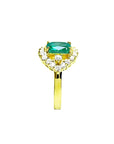 1.43 ct cushion-cut Muzo Colombian emerald ring with marquise diamond halo in 14K yellow gold.