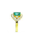 1.43 ct cushion-cut Muzo Colombian emerald ring with marquise diamond halo in 14K yellow gold.