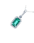 1.70 ct Muzo Colombian emerald pendant with diamond halo in 18K white gold.