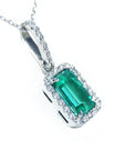 The right profile of this Colombian emerald pendant displays the topside and gallery profile.