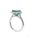 1.50 carat Muzo Colombian emerald solitaire ring in 18K white gold with a rectangular cut.