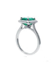 1.50 carat Muzo Colombian emerald solitaire ring in 18K white gold with a rectangular cut.