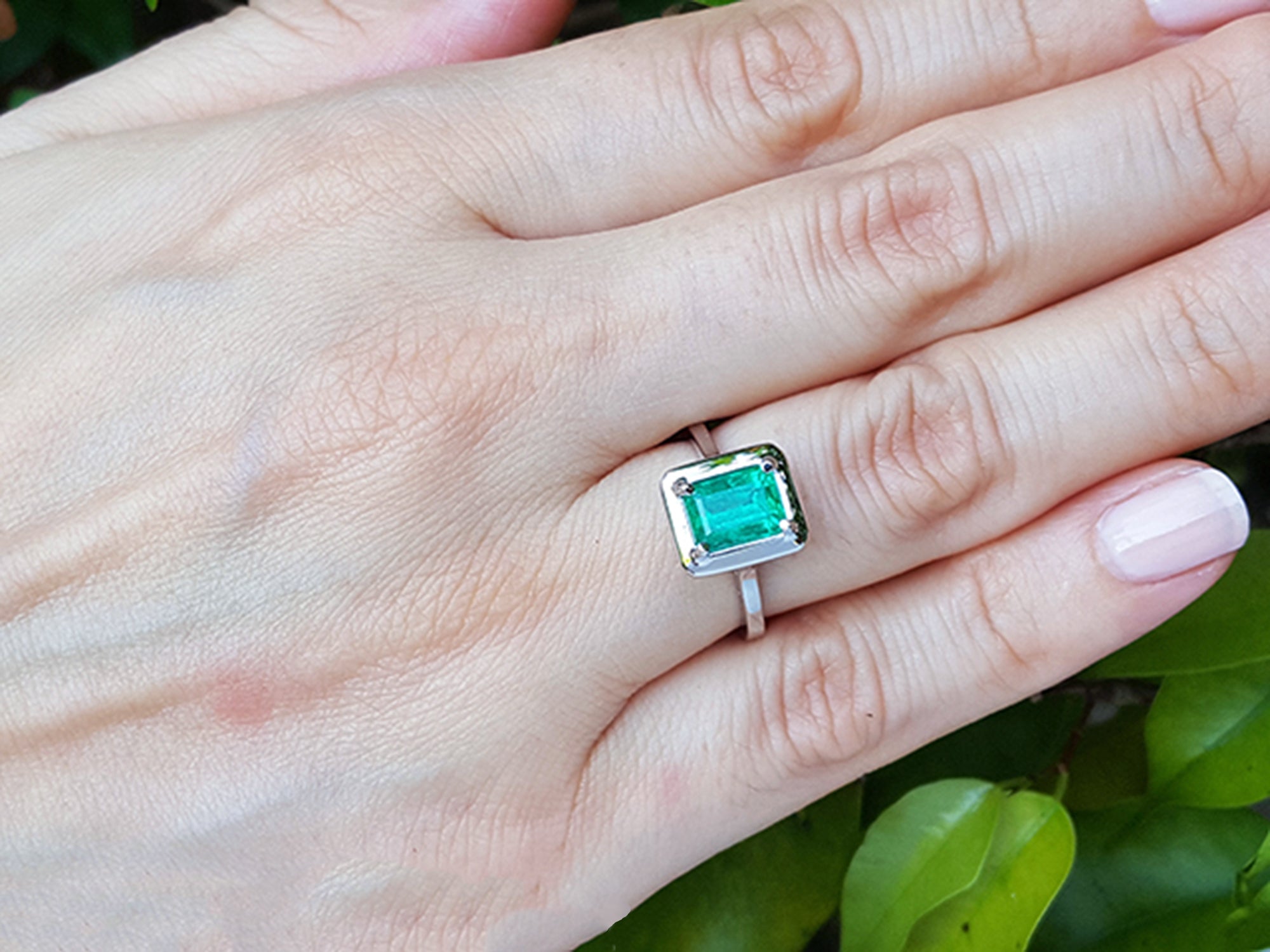 1.50 Carat Muzo Colombian Emerald Solitaire Ring in 18K White Gold