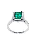 1.50 carat Muzo Colombian emerald solitaire ring in 18K white gold with a rectangular cut.