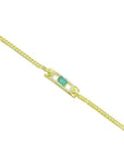 14K yellow gold bracelet with a rectangular Colombian emerald and diamond halo.