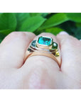 Men's 14K yellow gold ring with a rectangular 2.37 ct Muzo Colombian emerald, bezel set.