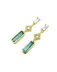 14K gold baguette emerald drop earrings with diamond accents.