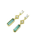 14K gold baguette emerald drop earrings with diamond accents.