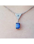 Necklace with a blue natural blue sapphire pendant emerald cut made of 14k white gold.