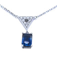 1.05 carat natural blue sapphire necklace in 14K white gold with a trillion diamond centerpiece.