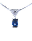 1.05 carat natural blue sapphire necklace in 14K white gold with a trillion diamond centerpiece.