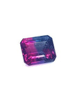 Natural 3.55 ct. watermelon tourmaline gemstone with vibrant red, mint, and greenish-blue hues.